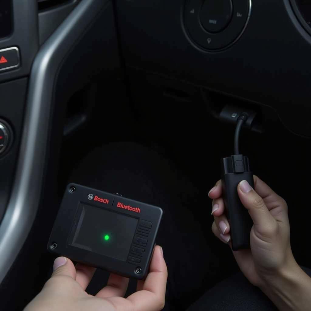 Bosch Bluetooth OBD2 Scanner Connected to Car OBD2 Port