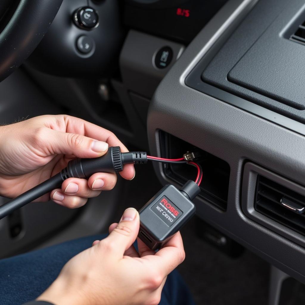 Technician Checking Ross Tech Cable Connections