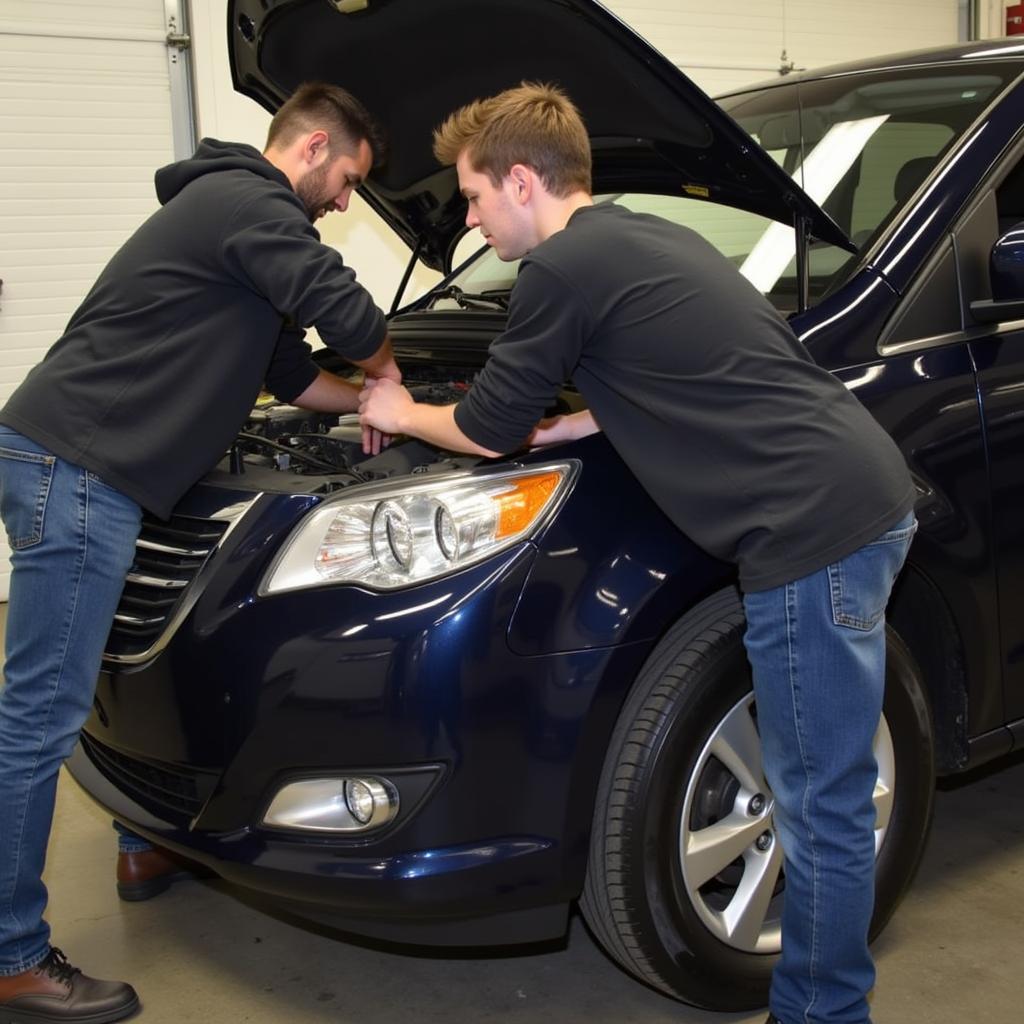 Sau Tech Automotive Training: Students Working on a Car